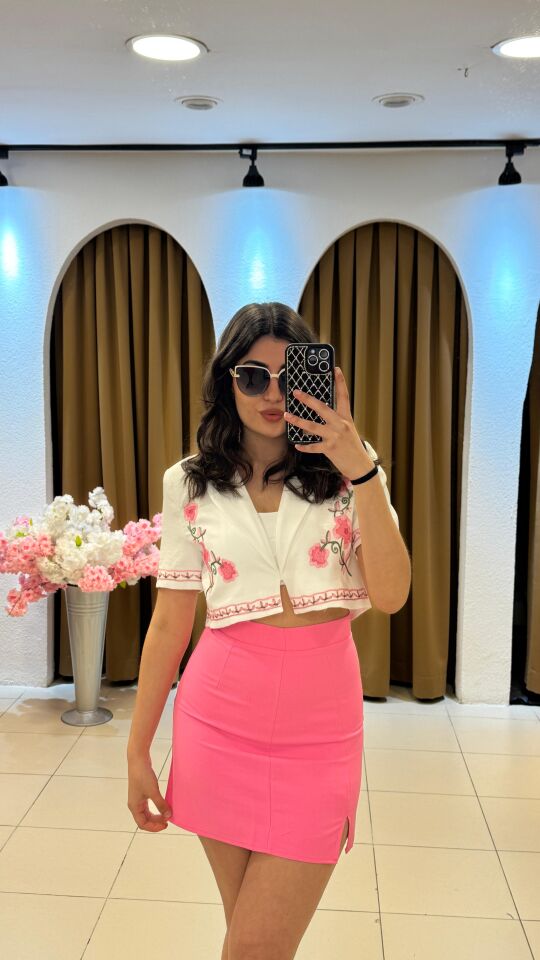 PEMBE MİNİ YIRTMAÇLI ETEK