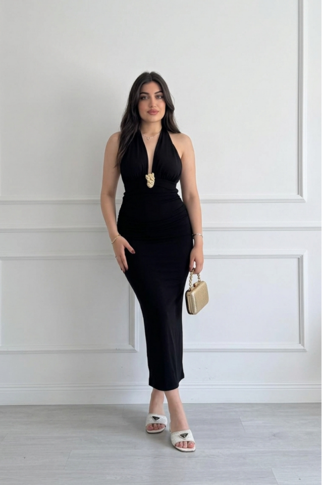 Siyah gold detayı olan boyundan düğmeli sırtı açık balık model şık elbise L
