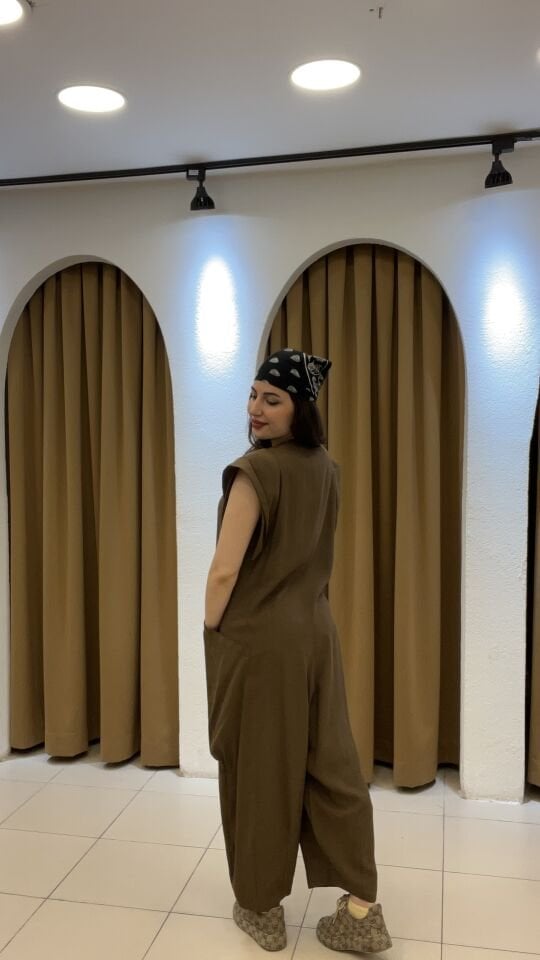 KAHVERENGİ TASARIM ÖNDEN FERMUARLI CEPLİ TULUM